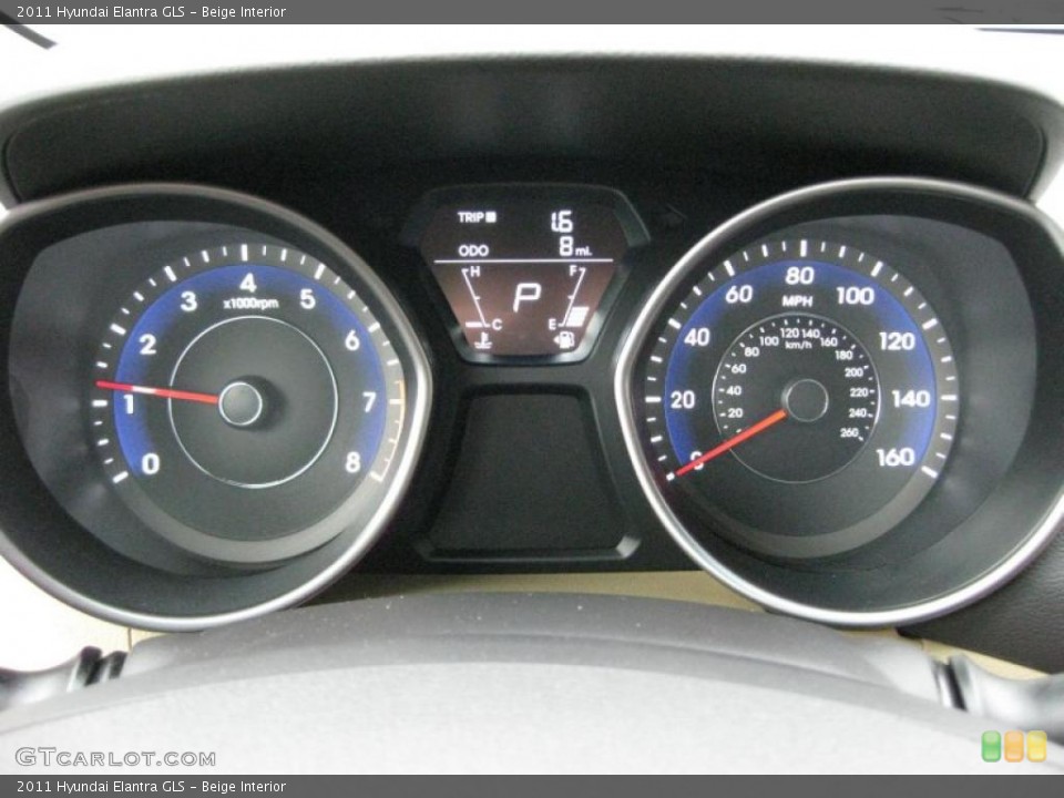 Beige Interior Gauges for the 2011 Hyundai Elantra GLS #41740754