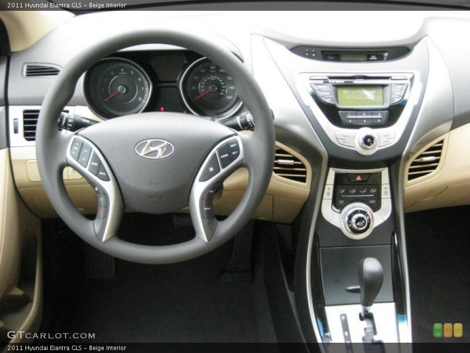 Beige Interior Dashboard for the 2011 Hyundai Elantra GLS #41741074