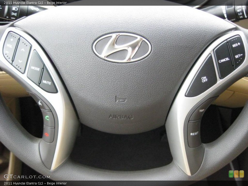 Beige Interior Controls for the 2011 Hyundai Elantra GLS #41741126