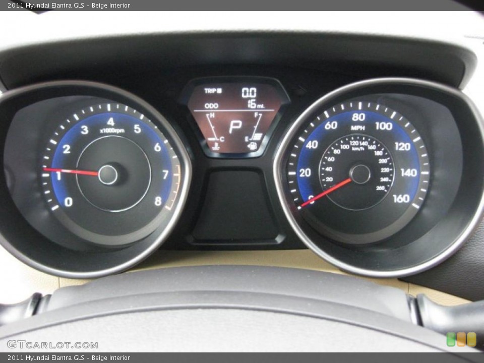 Beige Interior Gauges for the 2011 Hyundai Elantra GLS #41741134