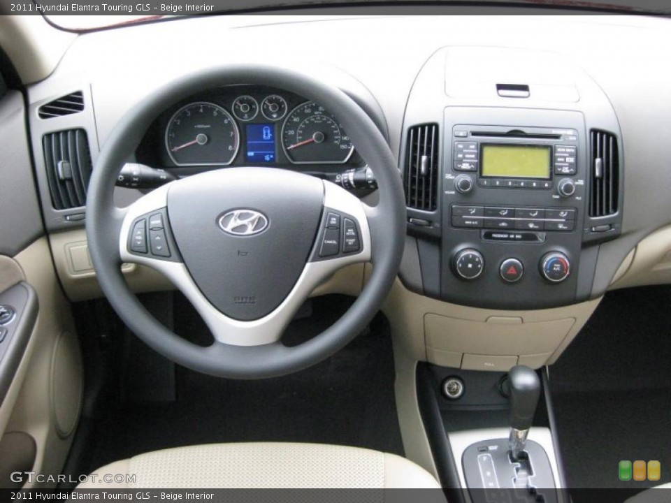 Beige Interior Dashboard for the 2011 Hyundai Elantra Touring GLS #41741494
