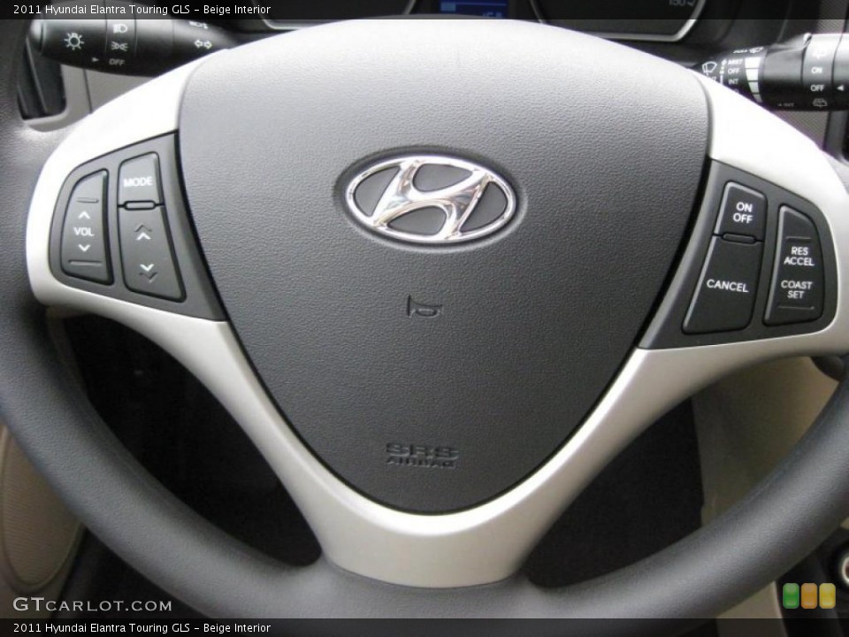 Beige Interior Controls for the 2011 Hyundai Elantra Touring GLS #41741546