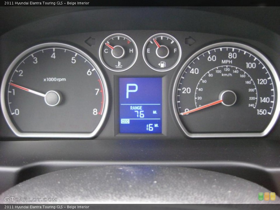 Beige Interior Gauges for the 2011 Hyundai Elantra Touring GLS #41741562