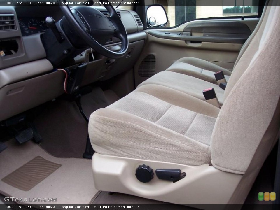 Medium Parchment Interior Photo for the 2002 Ford F250 Super Duty XLT Regular Cab 4x4 #41781185