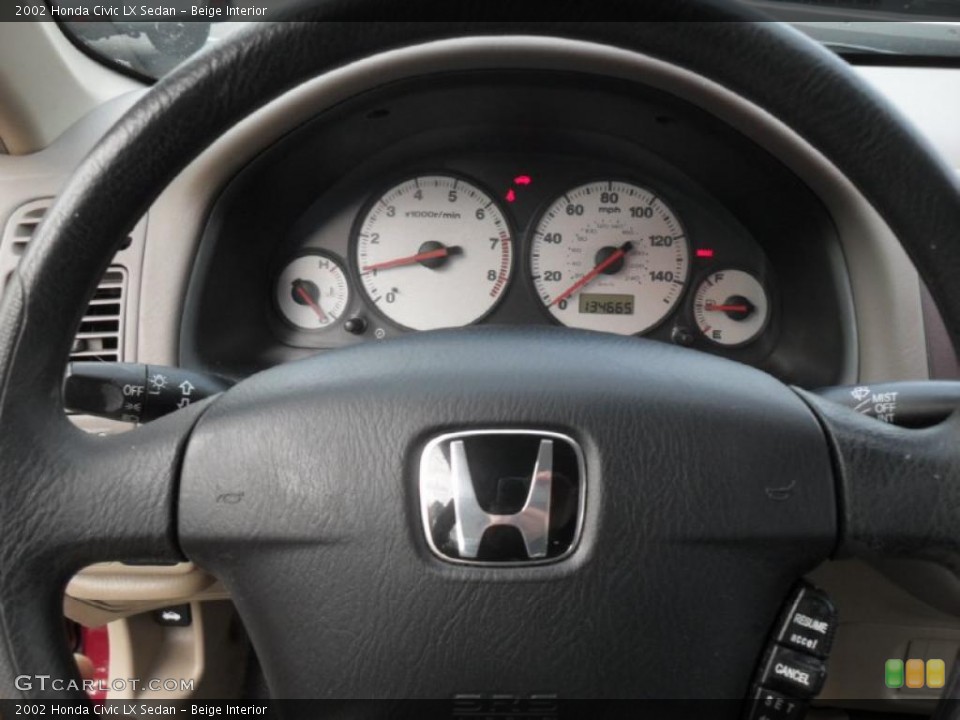 Beige Interior Steering Wheel for the 2002 Honda Civic LX Sedan #41820928