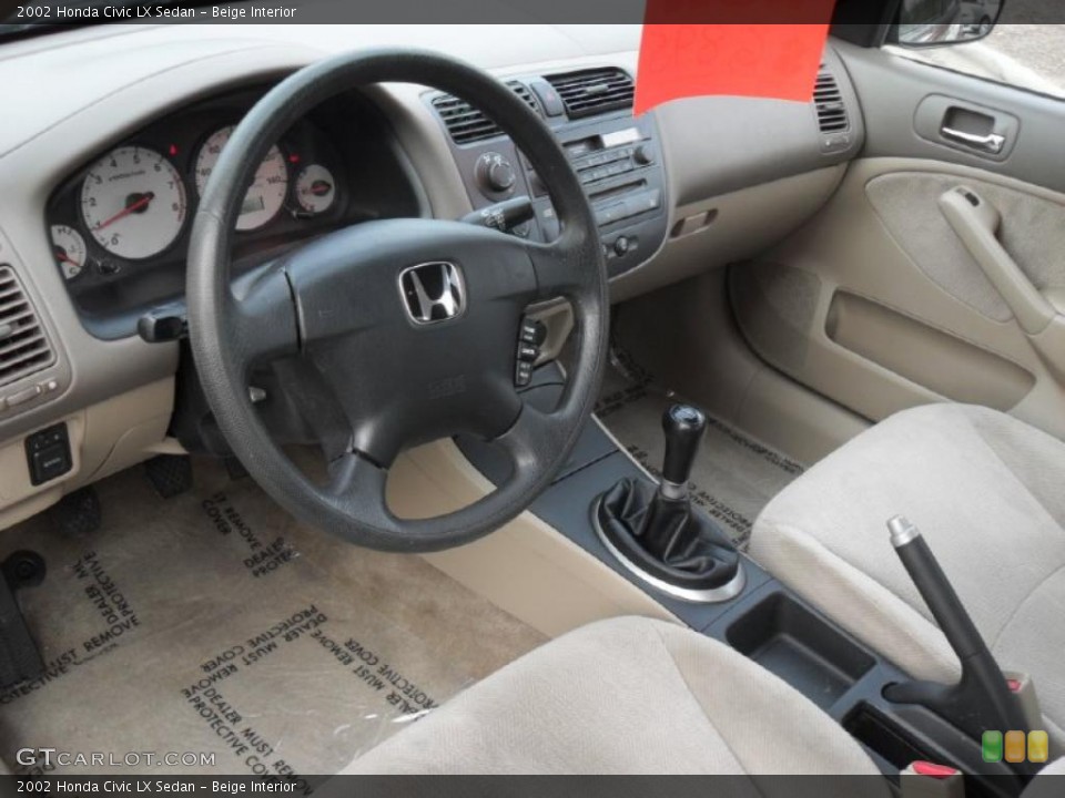 Beige Interior Prime Interior for the 2002 Honda Civic LX Sedan #41821147