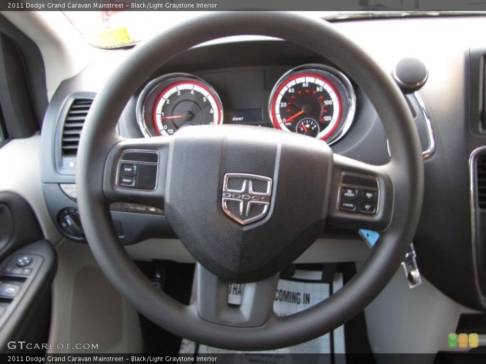 Black/Light Graystone Interior Steering Wheel for the 2011 Dodge Grand Caravan Mainstreet #41887174
