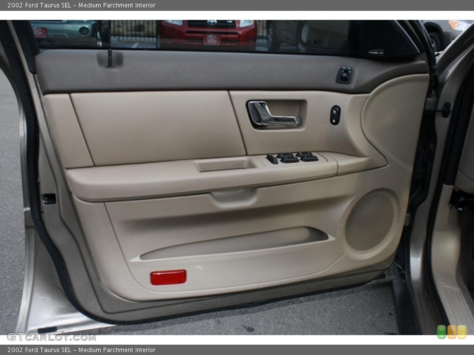 Medium Parchment Interior Door Panel for the 2002 Ford Taurus SEL #41887599