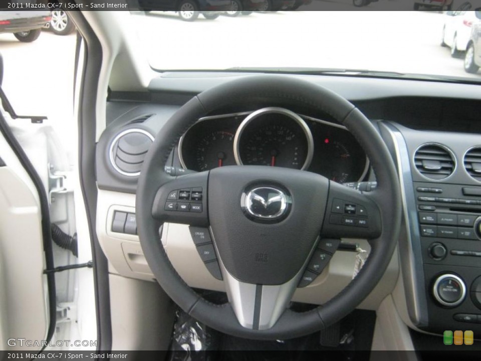 Sand Interior Steering Wheel for the 2011 Mazda CX-7 i Sport #41899520