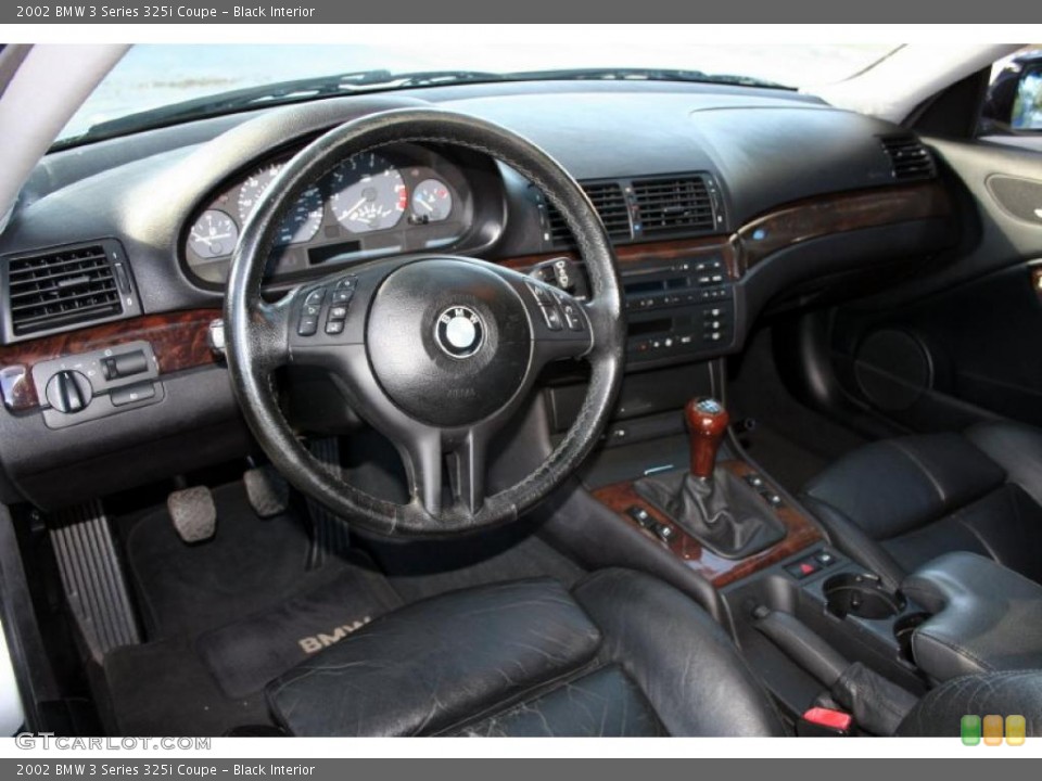 Black Interior Prime Interior for the 2002 BMW 3 Series 325i Coupe #41908028