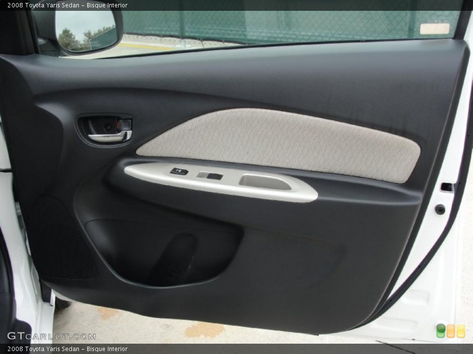 Bisque Interior Door Panel for the 2008 Toyota Yaris Sedan #41924891