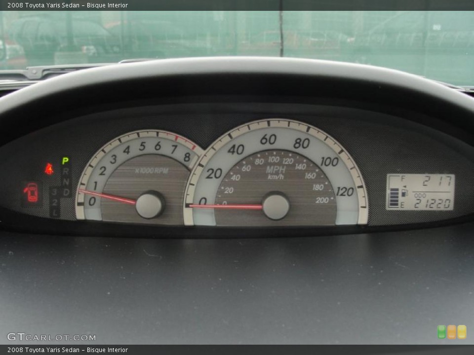 Bisque Interior Gauges for the 2008 Toyota Yaris Sedan #41925215