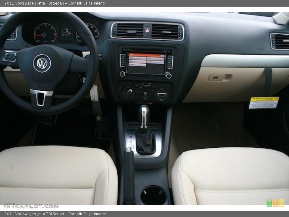 Cornsilk Beige Interior Dashboard for the 2011 Volkswagen Jetta TDI Sedan #41931096
