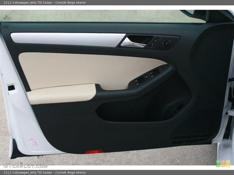 Cornsilk Beige Interior Door Panel for the 2011 Volkswagen Jetta TDI Sedan #41931196
