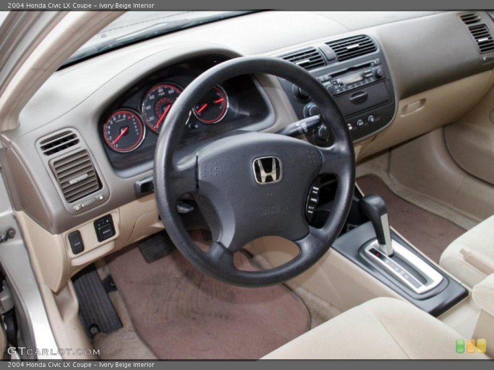 Ivory Beige Interior Prime Interior for the 2004 Honda Civic LX Coupe #42089123