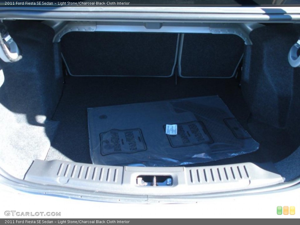 Light Stone/Charcoal Black Cloth Interior Trunk for the 2011 Ford Fiesta SE Sedan #42111933
