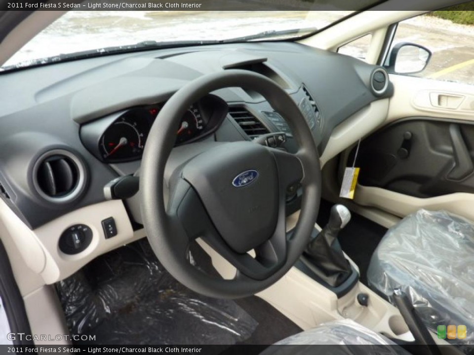Light Stone/Charcoal Black Cloth Interior Photo for the 2011 Ford Fiesta S Sedan #42114613