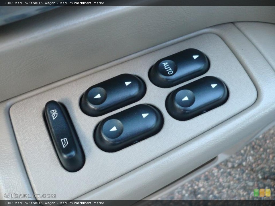 Medium Parchment Interior Controls for the 2002 Mercury Sable GS Wagon #42116385