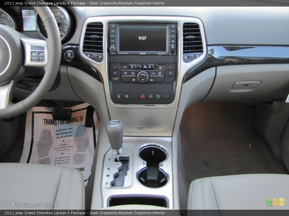 Dark Graystone/Medium Graystone Interior Dashboard for the 2011 Jeep Grand Cherokee Laredo X Package #42134623