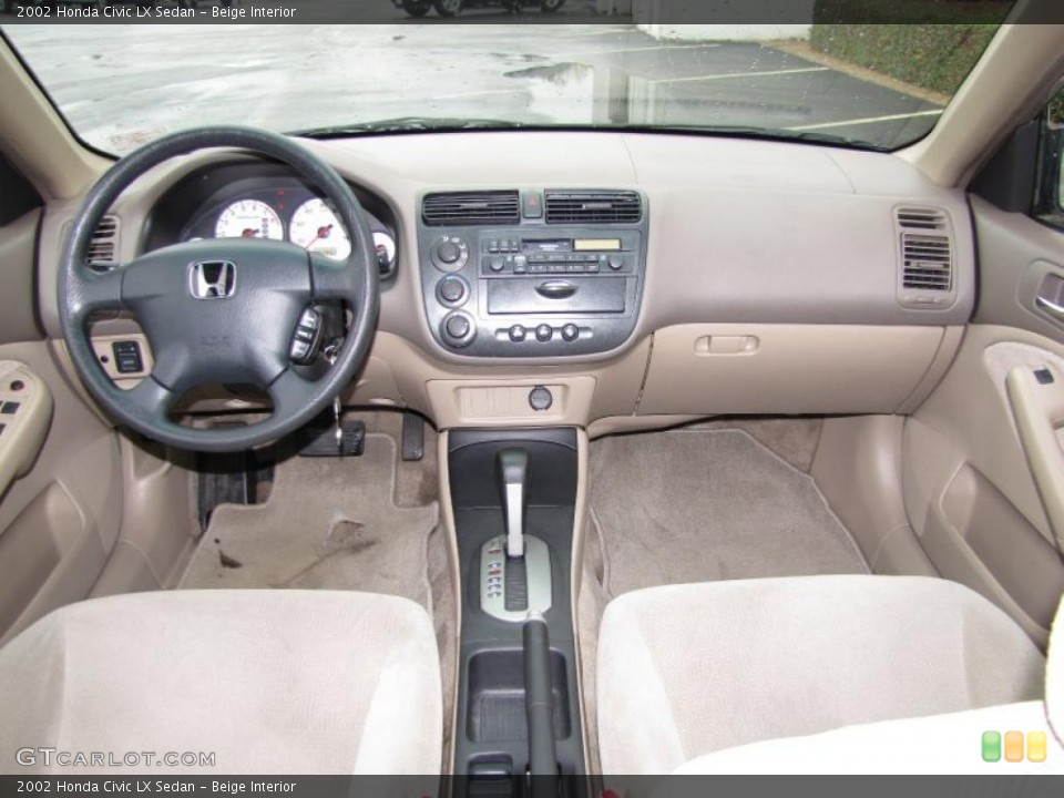 Beige Interior Prime Interior for the 2002 Honda Civic LX Sedan #42136427