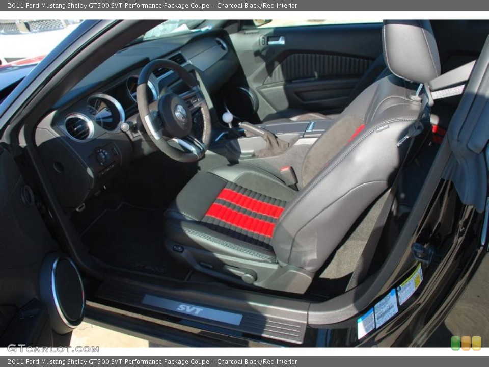 Charcoal Black/Red Interior Photo for the 2011 Ford Mustang Shelby GT500 SVT Performance Package Coupe #42142448