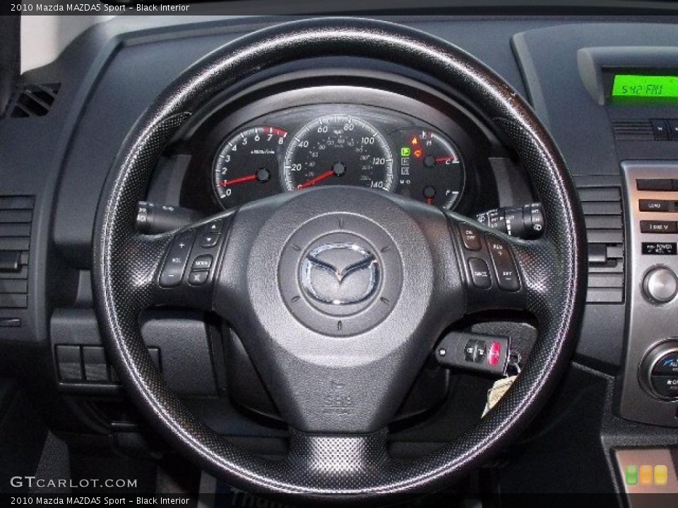 Black Interior Steering Wheel for the 2010 Mazda MAZDA5 Sport #42162668
