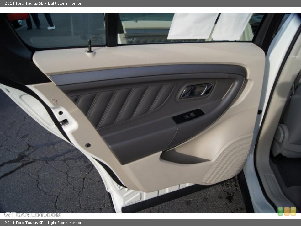 Light Stone Interior Door Panel for the 2011 Ford Taurus SE #42211919