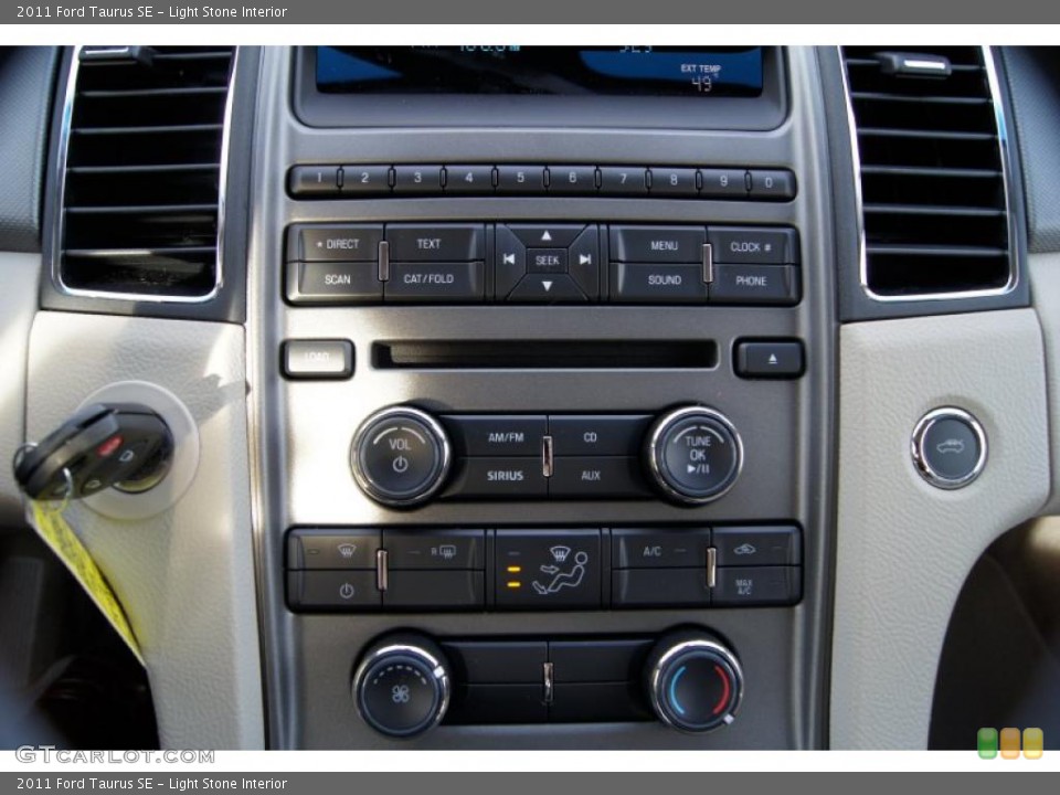 Light Stone Interior Controls for the 2011 Ford Taurus SE #42212151