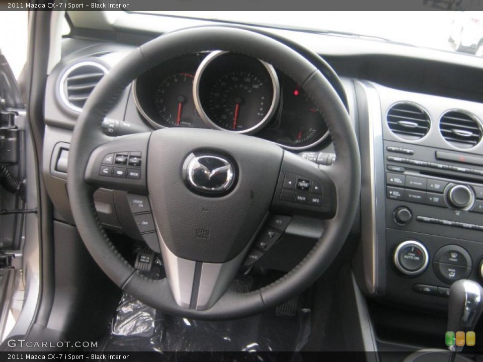Black Interior Steering Wheel for the 2011 Mazda CX-7 i Sport #42213167