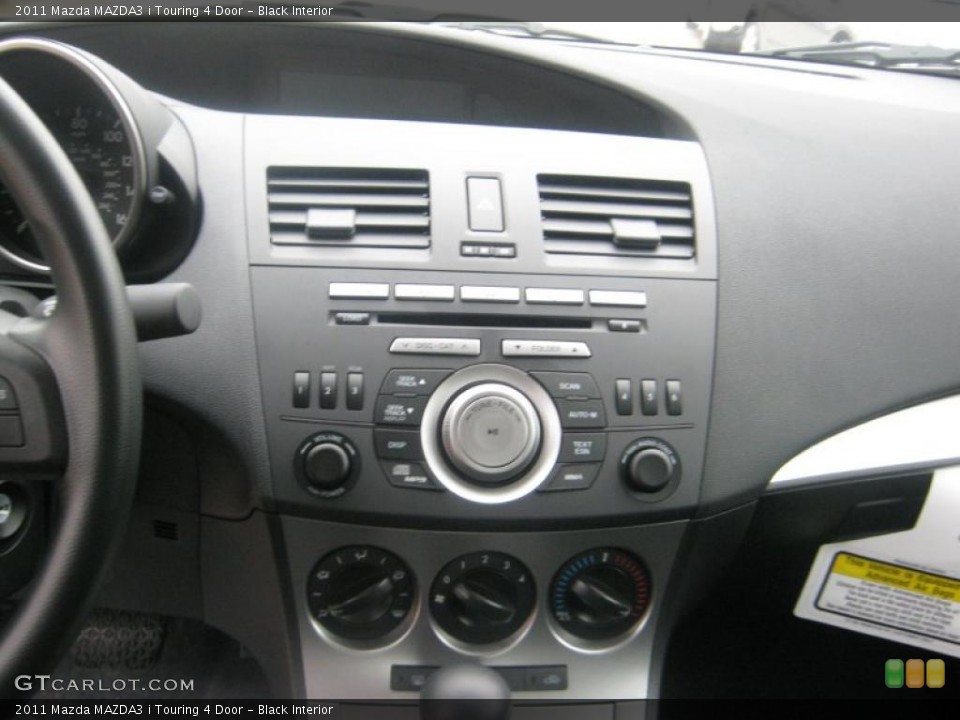 Black Interior Controls for the 2011 Mazda MAZDA3 i Touring 4 Door #42214007