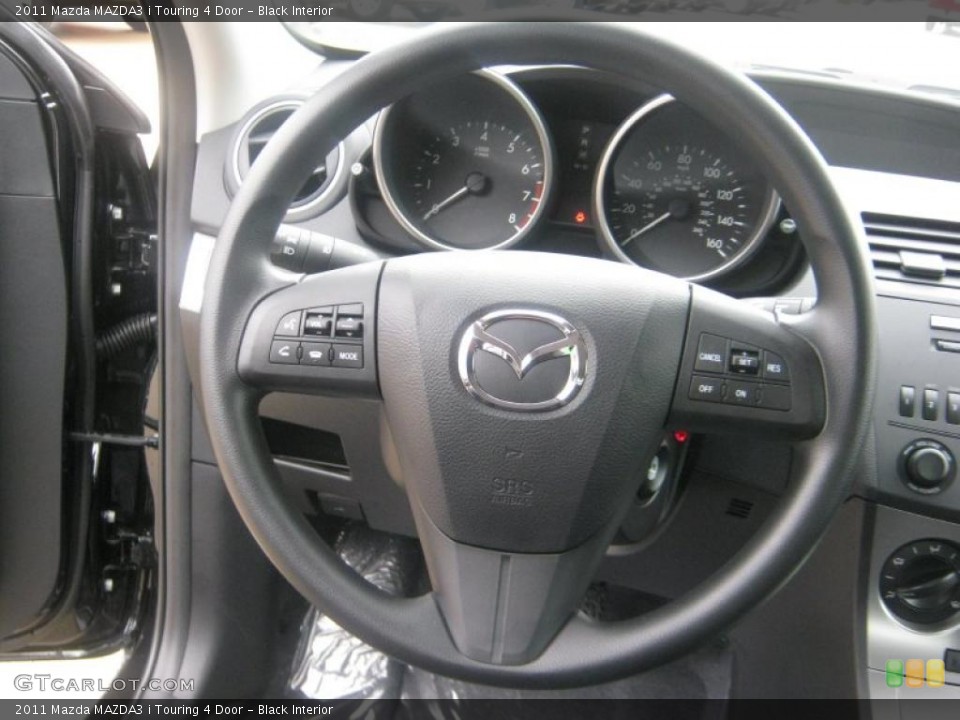 Black Interior Steering Wheel for the 2011 Mazda MAZDA3 i Touring 4 Door #42214023