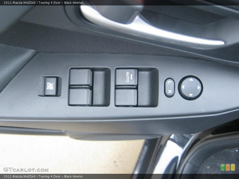 Black Interior Controls for the 2011 Mazda MAZDA3 i Touring 4 Door #42214115