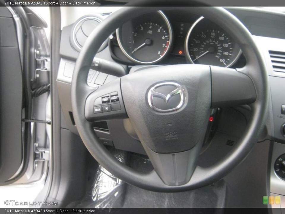 Black Interior Steering Wheel for the 2011 Mazda MAZDA3 i Sport 4 Door #42214420