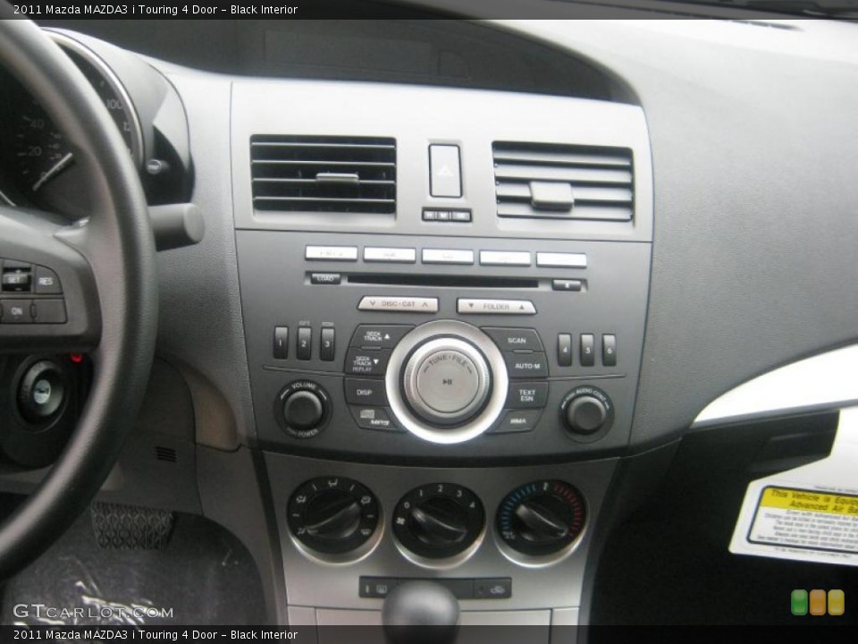 Black Interior Controls for the 2011 Mazda MAZDA3 i Touring 4 Door #42214808