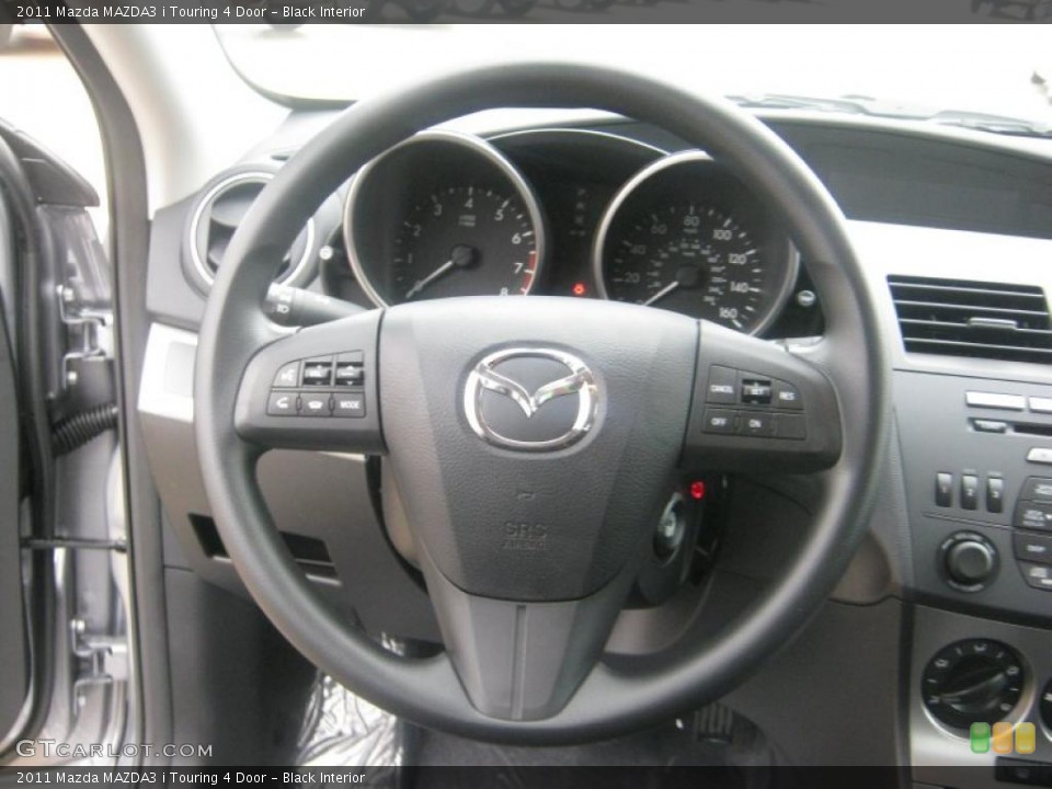 Black Interior Steering Wheel for the 2011 Mazda MAZDA3 i Touring 4 Door #42214824