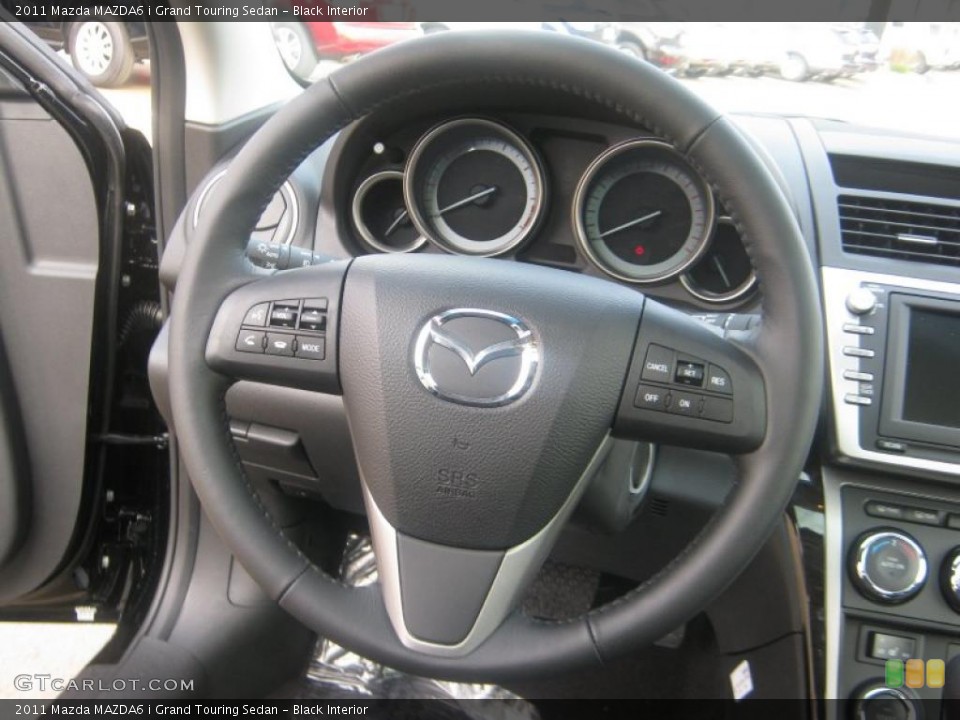 Black Interior Steering Wheel for the 2011 Mazda MAZDA6 i Grand Touring Sedan #42215215