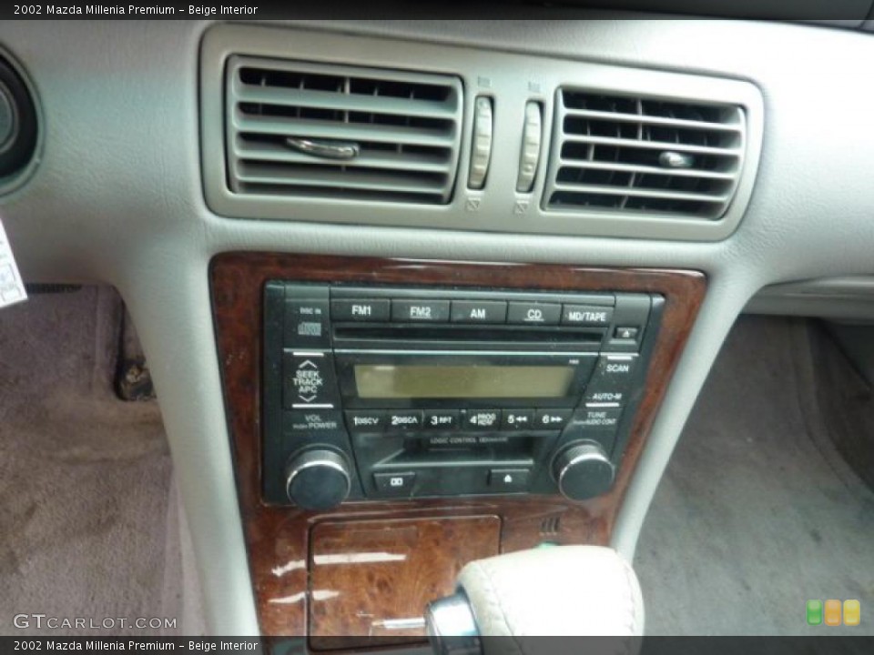 Beige Interior Controls for the 2002 Mazda Millenia Premium #42233384