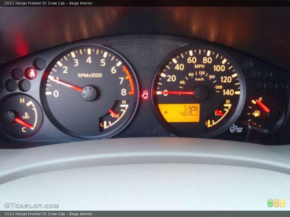 Beige Interior Gauges for the 2011 Nissan Frontier SV Crew Cab #42244675