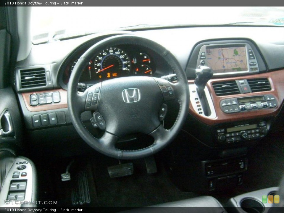 Black Interior Dashboard for the 2010 Honda Odyssey Touring #42249474