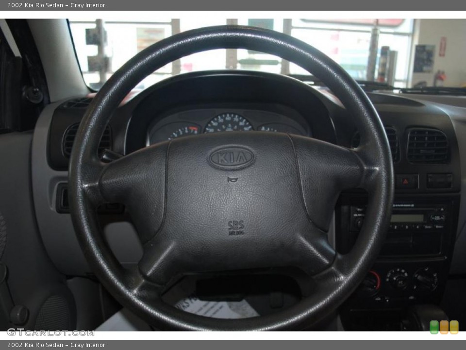 Gray Interior Steering Wheel for the 2002 Kia Rio Sedan #42262286