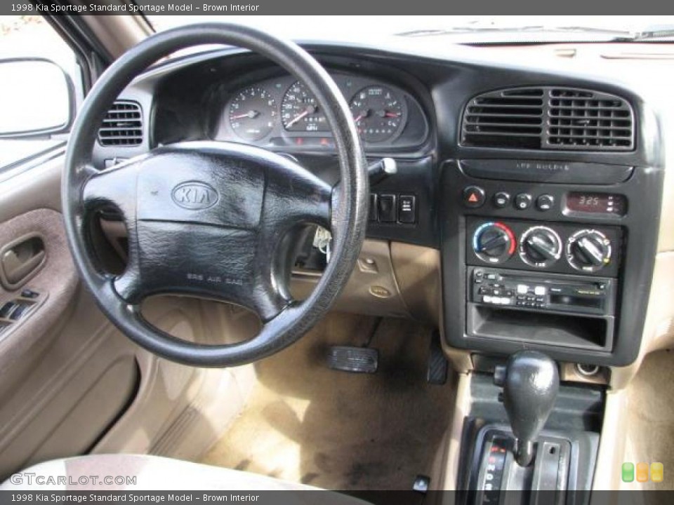 Brown Interior Dashboard for the 1998 Kia Sportage  #42290519