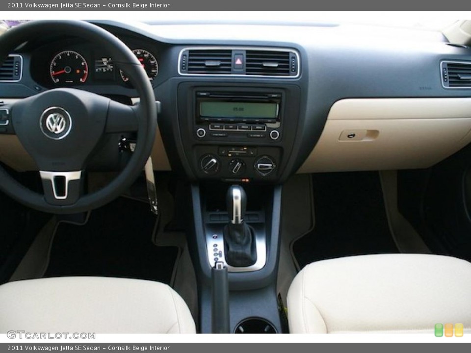 Cornsilk Beige Interior Dashboard for the 2011 Volkswagen Jetta SE Sedan #42291923