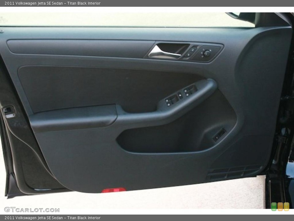 Titan Black Interior Door Panel for the 2011 Volkswagen Jetta SE Sedan #42292423