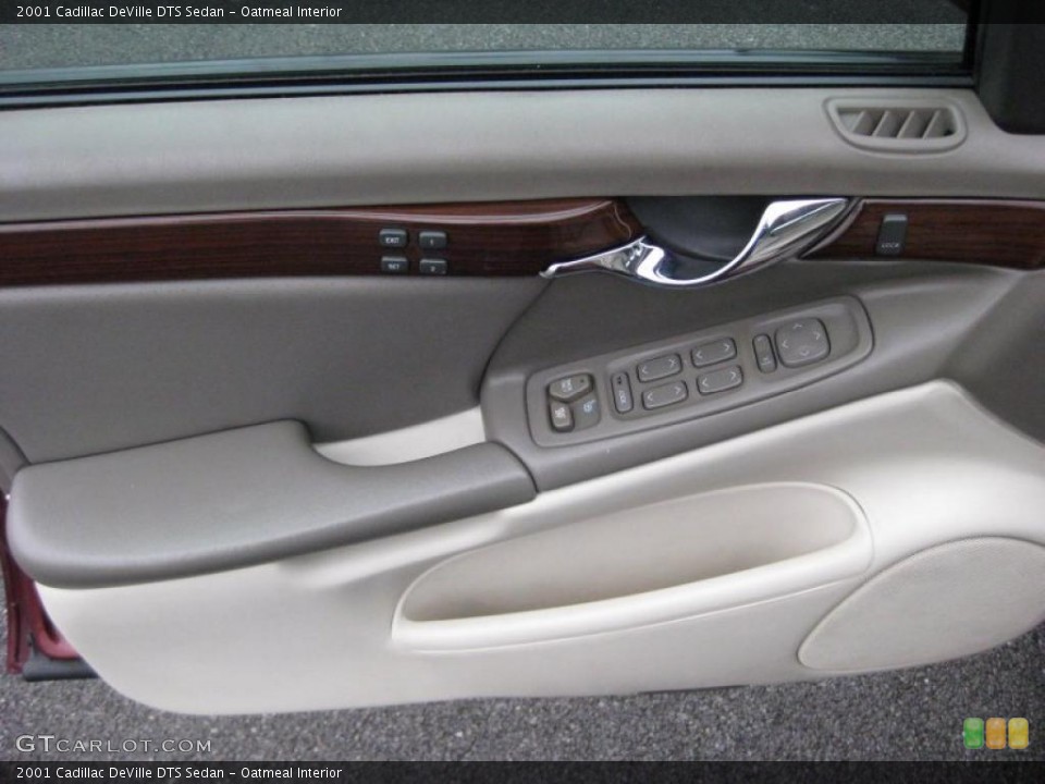 Oatmeal Interior Door Panel for the 2001 Cadillac DeVille DTS Sedan #42319335