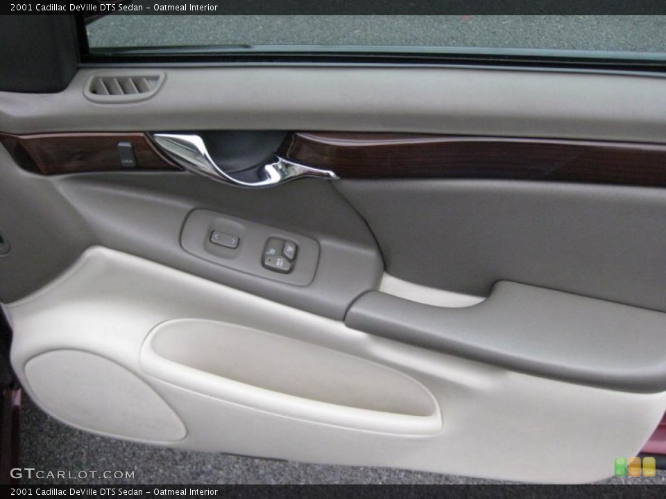 Oatmeal Interior Door Panel for the 2001 Cadillac DeVille DTS Sedan #42319431