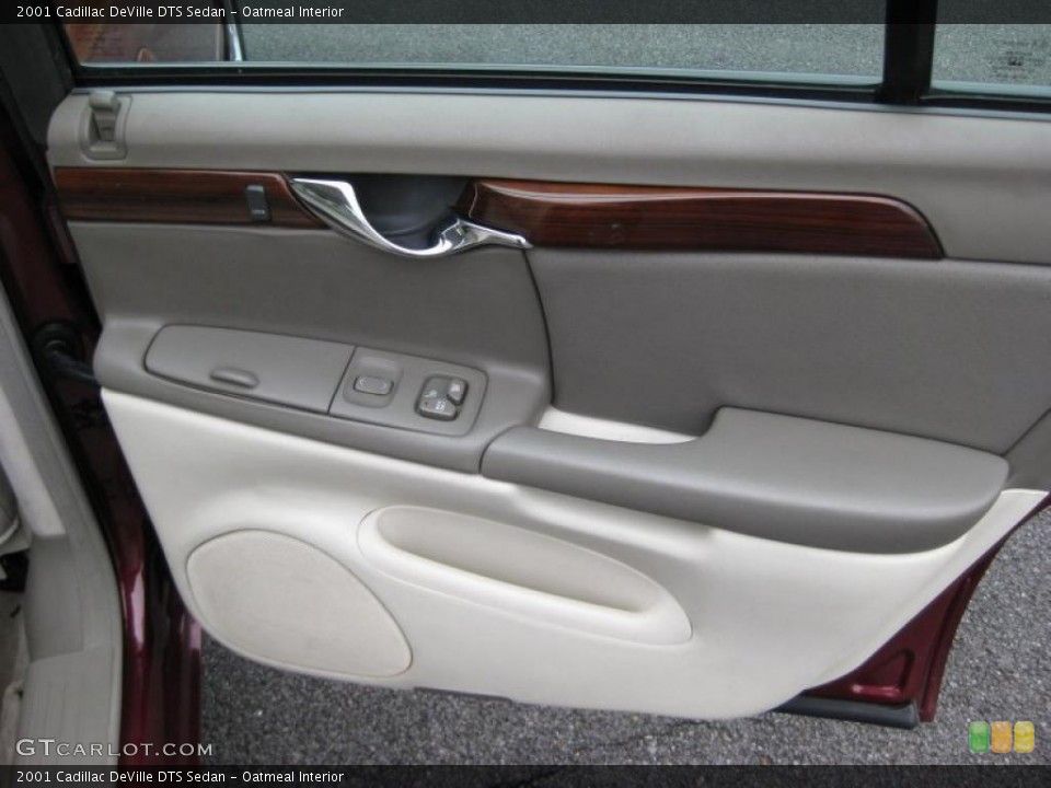Oatmeal Interior Door Panel for the 2001 Cadillac DeVille DTS Sedan #42319475