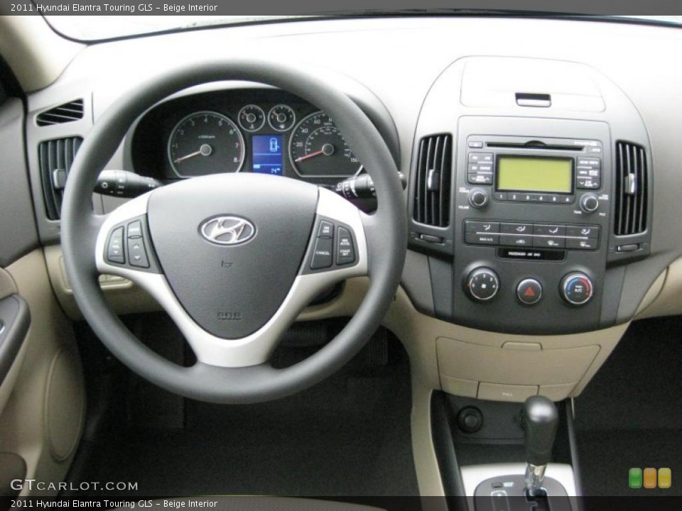 Beige Interior Dashboard for the 2011 Hyundai Elantra Touring GLS #42319527