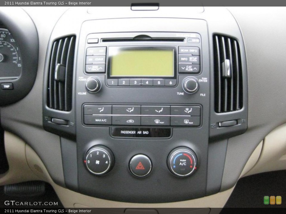 Beige Interior Controls for the 2011 Hyundai Elantra Touring GLS #42319543