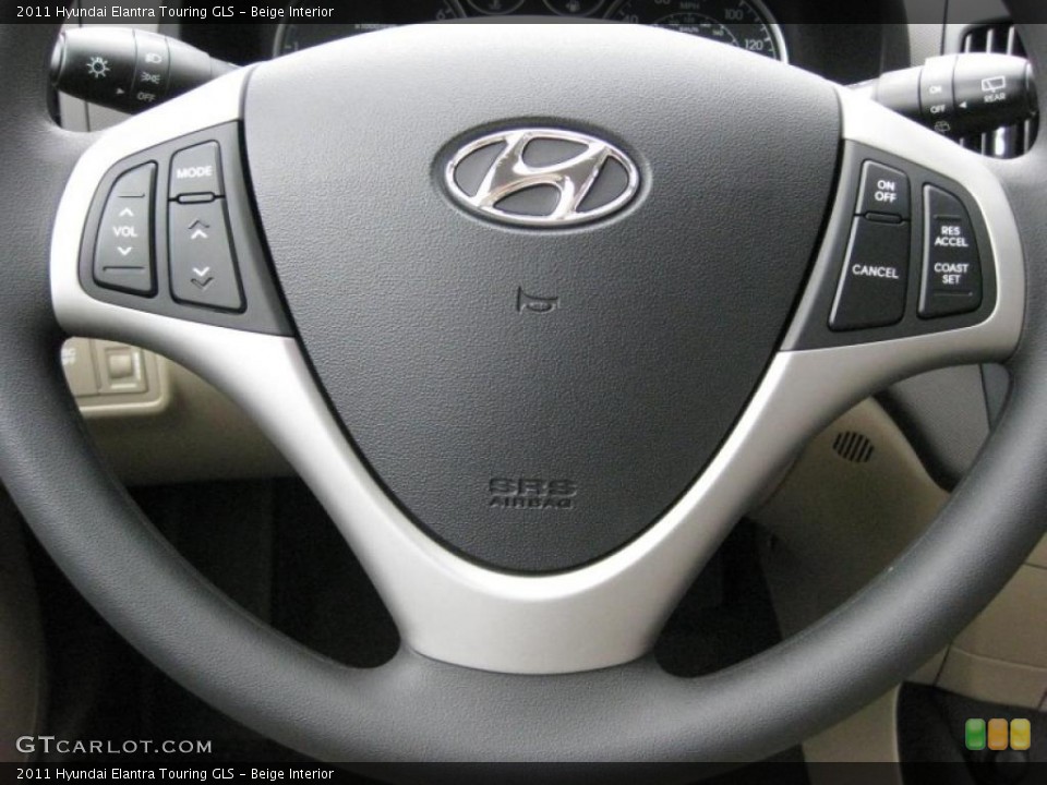 Beige Interior Controls for the 2011 Hyundai Elantra Touring GLS #42319579