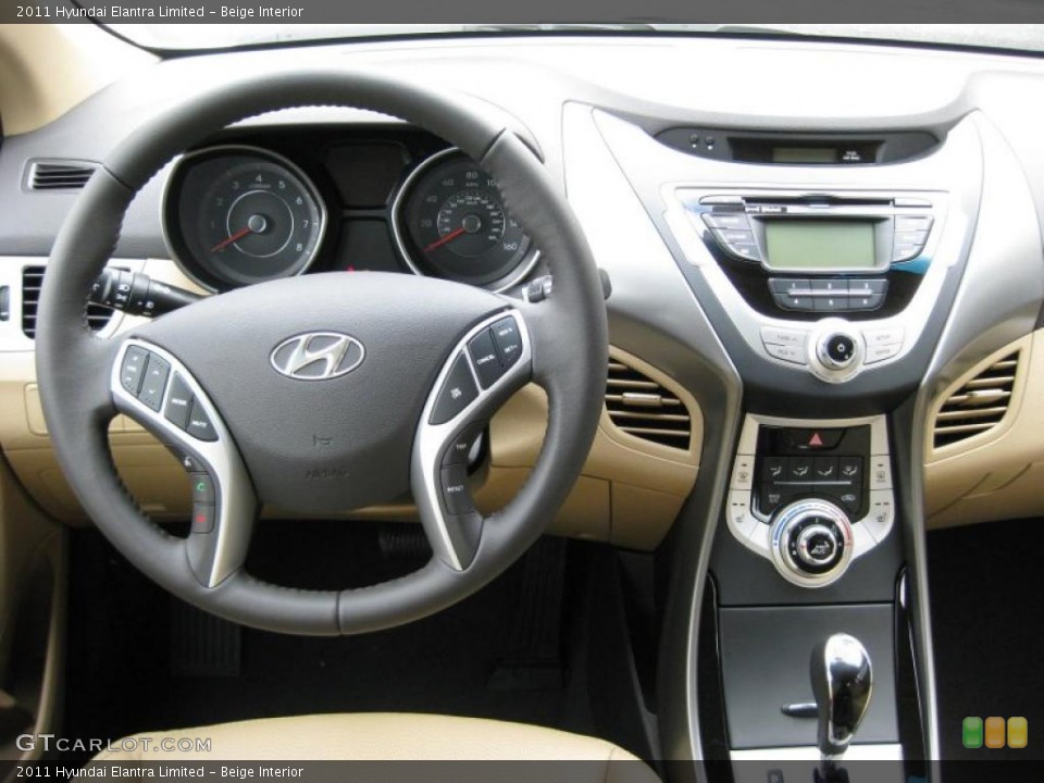 Beige Interior Dashboard for the 2011 Hyundai Elantra Limited #42321703